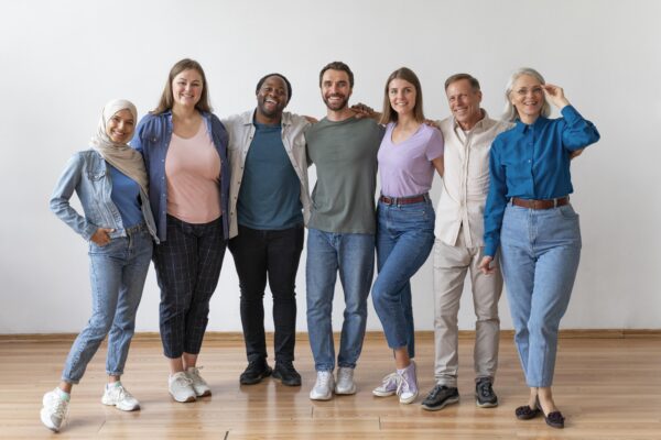 People posing together of all ages